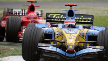 Spanish Renault driver Fernando Alonso steers his car ahead of German Ferrari driver Michael Schumacher on the Imola racetrack during the San Marino Grand Prix, 24 April 2005 in Imola, Italy. Fernando Alonso won the race ahead of Michael Schumacher and En