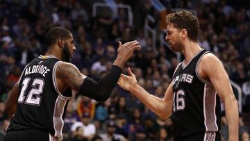 PHOENIX, AZ - DECEMBER 15: Pau Gasol #16 of the San Antonio Spurs high fives LaMarcus Aldridge #12 after scoring against the Phoenix Suns during the second half of the NBA game at Talking Stick Resort Arena on December 15, 2016 in Phoenix, Arizona. The Spurs defeated the Suns 107-92. NOTE TO USER: User expressly acknowledges and agrees that, by downloading and or using this photograph, User is consenting to the terms and conditions of the Getty Images License Agreement. Christian Petersen/Getty Images/AFP
== FOR NEWSPAPERS, INTERNET, TELCOS & TELEVISION USE ONLY ==
