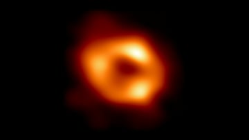 This is the first image of Sagittarius A* (or Sgr A* for short), the supermassive black hole at the center of our galaxy. It was captured by the Event Horizon Telescope (EHT), an array which linked together radio observatories across the planet to form a single "Earth-sized" virtual telescope. The new view captures light bent by the powerful gravity of the black hole, which is four million times more massive than our Sun.  EHT Collaboration/National Science Foundation/Handout via REUTERS