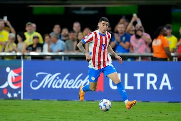 Jun 28, 2024; Las Vegas, NV, USA; Paraguay midfielder Miguel Almiron (10) moves the ball against Brazil during the second half at Allegiant Stadium. Mandatory Credit: Lucas Peltier-USA TODAY Sports