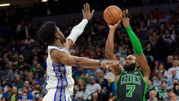 Mar 18, 2022; Sacramento, California, USA; Boston Celtics guard Jaylen Brown (7) shoots a three point basket against Sacramento Kings forward Chimezie Metu (7) during the third quarter at Golden 1 Center. Mandatory Credit: Neville E. Guard-USA TODAY Sports