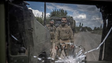 Attention Editors: Picture kill for RC2ND9AE1571. The picture is removed after a post-publication review. Regions Affected: WORLDWIDE Please remove it from your systems as follows: If this image has already been used online, please remove it from your properties and pages. If this image is intended for a publication that has NOT yet gone to print, please cancel publication of this image. If this image is archived in any of your systems, please permanently delete it. We are sorry for any inconvenience caused.Ukrainian servicemen pose for a picture as they repair a military vehicle, amid Russia's attack on Ukraine, near the Russian border in Sumy region, Ukraine August 11, 2024. REUTERS/Viacheslav Ratynskyi TPX IMAGES OF THE DAY