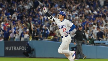 Sep 30, 2025; Los Angeles, California, USA; Los Angeles Dodgers designated hitter Shohei Ohtani (17) rounds the bases after hitting a two run home run during the sixth inning against the Cincinnati Reds during game one of the Wildcard round for the 2025 MLB playoffs at Dodger Stadium. Mandatory Credit: Jayne Kamin-Oncea-Imagn Images