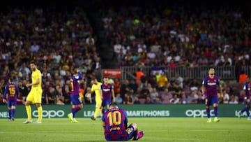 Barcelona make hard work of Villarreal as Messi suffers injury