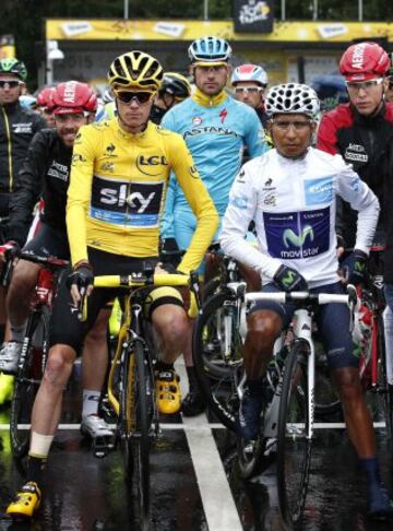 Team Sky rider Chris Froome of Britain (L), race leader's yellow jersey, and Movistar rider Nairo Quintana of Colombia (R) wait for the start of the 109.5-km (68 miles) final 21st stage of the 102nd Tour de France cycling race from Sevres to Paris Champs-Elysees, France, July 26, 2015.  REUTERS/Benoit Tessier
