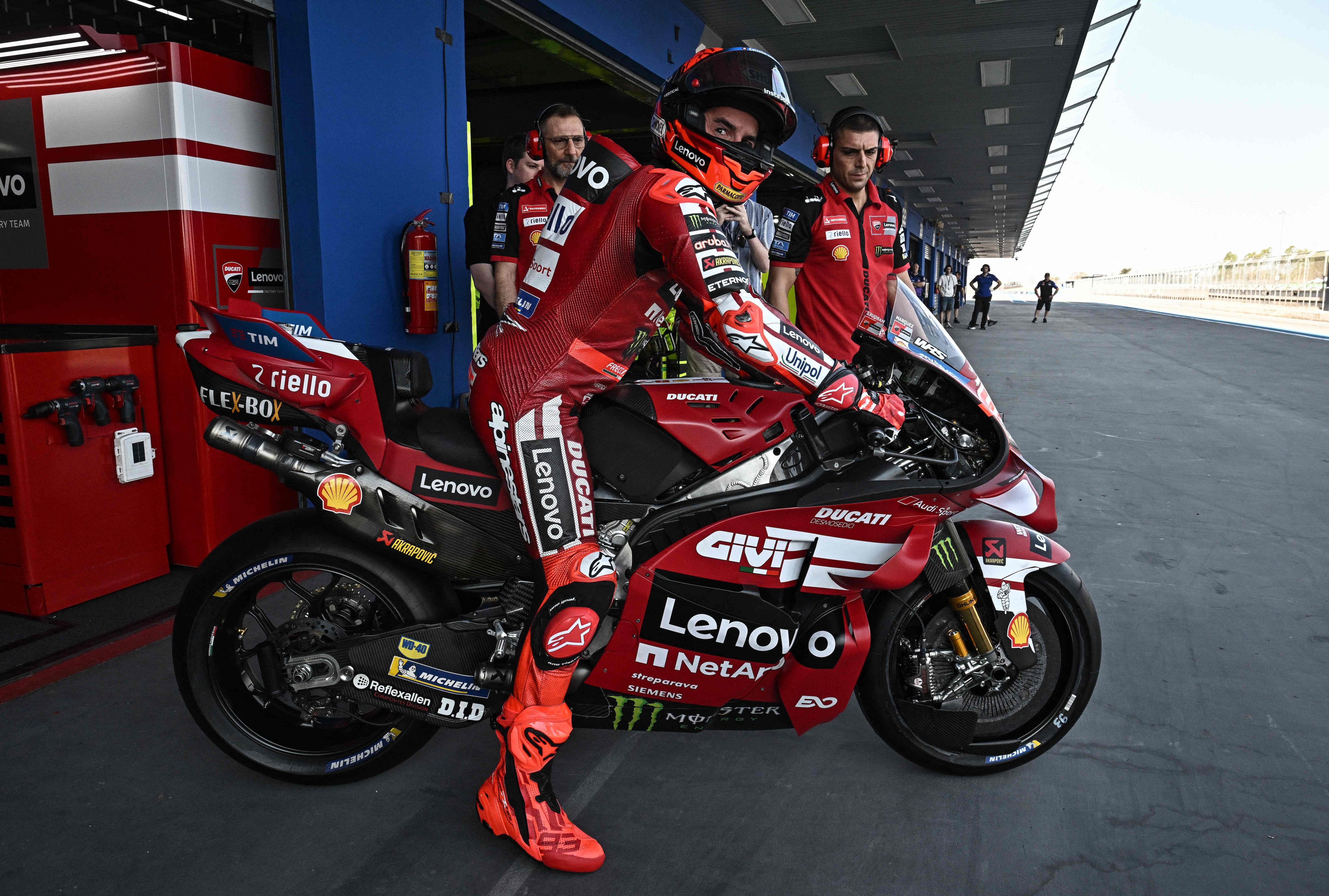 Ducati Lenovo Team's Spanish rider Marc Marquez prepares to leave the garage during the first day of the 2026 MotoGP pre-season test at the Buriram International Circuit in Buriram on February 21, 2026. (Photo by Lillian SUWANRUMPHA / AFP)