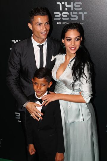 Cristiano Ronaldo poses with his son, Cristiano Ronaldo Jr, and girlfriend Georgina Rodríguez.