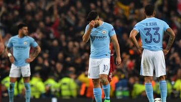 Manchester City's Argentinian striker Sergio Aguero (C) reacts during the UEFA Champions League second leg quarter-final football match between Manchester City and Liverpool, at the Etihad Stadium in Manchester, north west England on April 10, 2018.
