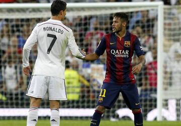 Neymar and Cristiano shake hands during a Clasico last season.