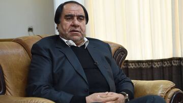 Afghan football boss Keramuddin Karim looks on as he speaks during an interview with AFP in Kabul on December 31, 2018. - Afghan football boss Keramuddin Karim on December 31 rejected allegations he sexually and physically abused members of the women&#039