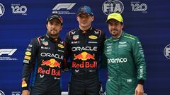 (L-R) Red Bull Racing's Mexican driver Sergio Perez, Red Bull Racing's Dutch driver Max Verstappen and Aston Martin's Spanish driver Fernando Alonso pose after the qualifying session for the Formula One Chinese Grand Prix at the Shanghai International Circuit in Shanghai on April 20, 2024. (Photo by HECTOR RETAMAL / AFP)