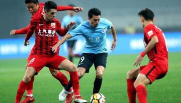 Gaitán, ex del Atlético, en un partido de la Superliga China.