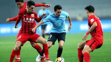 Gaitán, ex del Atlético, en un partido de la Superliga China.