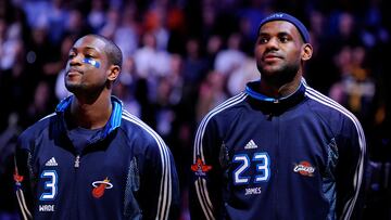 PHOENIX - FEBRUARY 15:  Dwyane Wade #3 and LeBron James #23 of the Eastern Conference stand during the National Anthem before the 58th NBA All-Star Game, part of 2009 NBA All-Star Weekend at US Airways Center on February 15, 2009 in Phoenix, Arizona.  NOTE TO USER: User expressly acknowledges and agrees that, by downloading and or using this photograph, User is consenting to the terms and conditions of the Getty Images License Agreement.  (Photo by Kevork Djansezian/Getty Images)