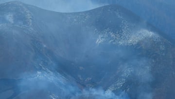 The main cone of the Cumbre Vieja volcano without activity in the last few hours is seen from the Tajuya viewpoint, on the Canary Island of La Palma, Spain, December 15, 2021.