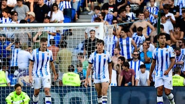 (From L) Real Sociedad's Spanish goalkeeper #01 Alex Remiro, Real Sociedad's Spanish defender #20 Jon Pacheco, Real Sociedad's French defender #24 Robin Le Normand and Real Sociedad's Spanish midfielder #04 Martin Zubimendi react to the equalizing goal scored by Celta Vigo's Spanish defender #03 Oscar Mingueza during the Spanish Liga football match between Real Sociedad and RC Celta de Vigo at the Anoeta stadium in San Sebastian on August 19, 2023. (Photo by ANDER GILLENEA / AFP)