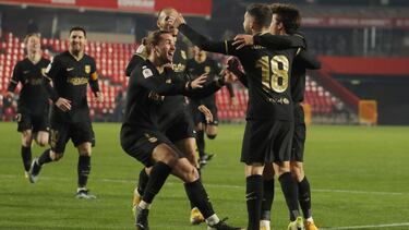 Soccer Football - Copa del Rey - Quarter Final - Granada v FC Barcelona - Nuevo Estadio de Los Carmenes, Granada, Spain - February 3, 2021 Barcelona's Jordi Alba scores their fifth goal with teammates REUTERS/Jon Nazca