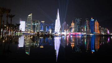 14 November 2022, Qatar, Doha: Soccer, before the World Cup, the skyline of Doha reflected in a pane of glass. The World Cup begins on November 20, 2022, with the opening match between Qatar and Ecuador. Photo: Federico Gambarini/dpa (Photo by Federico Gambarini/picture alliance via Getty Images)