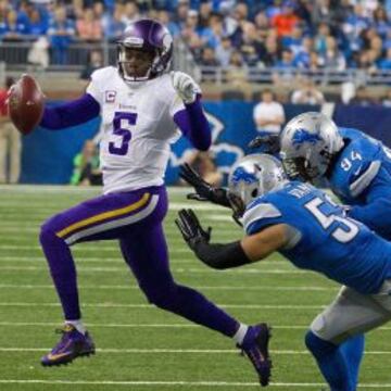 Teddy Bridgewater corriendo por su vida ante los Lions.