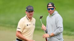 Joel Dahmen of the United States and caddie Geno Bonnalie