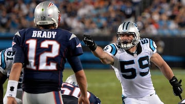 Carolina Panthers linebacker Luke Kuechly, right, points and yells out instructions to the defensive line as New England Patriots quarterback Tom Brady prepares to call a play during second quarter action at Bank of America Stadium in Charlotte, NC on Friday, August 28, 2015.