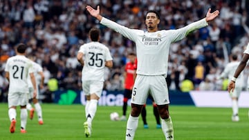 Real Madrid's English midfielder #05 Jude Bellingham celebrates scoring his team's second goal during the Spanish league football match between Real Madrid CF and CA Osasuna at the Santiago Bernabeu stadium in Madrid on November 9, 2024. (Photo by OSCAR DEL POZO / AFP)