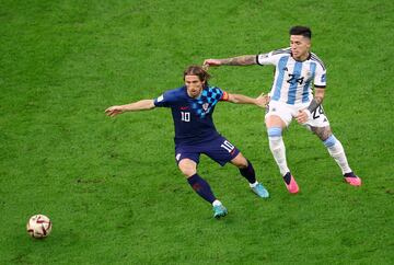 Croatia's Luka Modric in action with Argentina's Enzo Fernandez REUTERS/Hannah Mckay