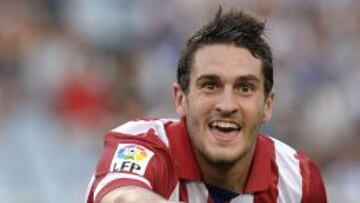 Atletico Madrid's Koke celebrates scoring a goal during their Spanish first division soccer match against Real Sociedad at Anoeta Stadium in San Sebastian September 1, 2013. REUTERS/Vincent West (SPAIN - Tags: SPORT SOCCER)