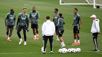 Soccer Football - Champions League - Real Madrid Training - Ciudad Real Madrid, Madrid, Spain - September 13, 2022 Real Madrid's Thibaut Courtois, David Alaba and Eder Militao during training REUTERS/Juan Medina