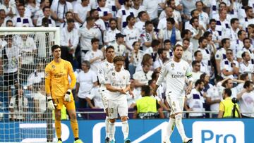 Soccer Football - Group A - Real Madrid v Club Brugge - Santiago Bernabeu, Madrid, Spain - October 1, 2019 Real Madrid's Sergio Ramos, Luka Modric, Raphael Varane and Thibaut Courtois look dejected after Club Brugge's Emmanuel Dennis scored his