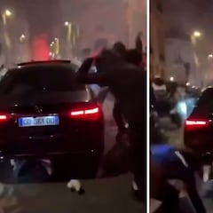 Un coche atropella a aficionados del PSG en los Campos Elíseos y lo acaban destrozando
