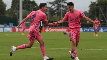 NYON, SWITZERLAND - AUGUST 16: Sergio Arribas of Real Madrid celebrates with teammate Carlos Gonzalez after scoring to level the game at 1-1 during the UEFA Youth League Round of Sixteen match between Juventus v Real Madrid at Colovray Sports Centre on Au