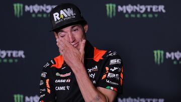 Aprilia Spanish rider Aleix Espargaro gets emotional after announcing his retirement from MotoGP at the end of the 2024 season, during a press conference at the Catalunya racetrack in Montmelo, near Barcelona, on May 23, 2024, ahead of the Catalunya Moto GP Grand Prix. (Photo by LLUIS GENE / AFP)