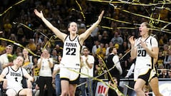 IOWA CITY, IOWA- MARCH 3: Guard Caitlin Clark #22 and guard Kate Martin #20 of the Iowa Hawkeyes celebrates in the confetti after senior day festivities after the match-up against the Ohio State Buckeyes at Carver-Hawkeye Arena on March 3, 2024 in Iowa City, Iowa.   Matthew Holst/Getty Images/AFP (Photo by Matthew Holst / GETTY IMAGES NORTH AMERICA / Getty Images via AFP)
