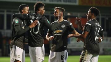 Soccer Football - Carabao Cup Third Round - Luton Town v Manchester United - Kenilworth Road, Luton, Britain - September 22, 2020 Manchester United's Marcus Rashford celebrates scoring their second goal with teammates Pool via REUTERS/Nick Potts EDIT