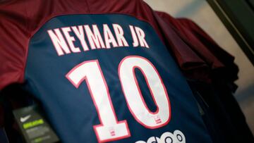 (FILES) This file photograph taken on August 4, 2017, shows the number 10 jersey of Paris-Saint-Germain's Brazilian forward Neymar on display at the Paris-Saint-Germain (PSG) football club store on the Champs Elysees avenue in Paris. - The Bouches-du