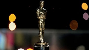 FILE PHOTO: An Oscars statuette on display at a screening of the Oscars in Paris, France April 26, 2021. Lewis Joly/Pool via REUTERS/File Photo