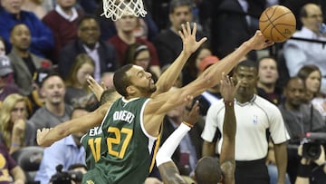 Mar 16, 2017; Cleveland, OH, USA; Utah Jazz center Rudy Gobert (27) blocks a shot by Cleveland Cavaliers guard Kyrie Irving (2) in the third quarter at Quicken Loans Arena. Mandatory Credit: David Richard-USA TODAY Sports