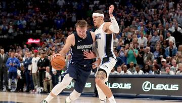 DALLAS, TEXAS - NOVEMBER 06: Luka Doncic #77 of the Dallas Mavericks drives to the basket against Aaron Gordon #00 of the Orlando Magic in the second half at American Airlines Center on November 06, 2019 in Dallas, Texas. NOTE TO USER: User expressly acknowledges and agrees that, by downloading and or using this photograph, User is consenting to the terms and conditions of the Getty Images License Agreement.   Tom Pennington/Getty Images/AFP
 == FOR NEWSPAPERS, INTERNET, TELCOS &amp; TELEVISION USE ONLY ==