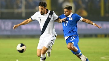 Guatemala's defender #07 Aaron Herrera and El Salvador's midfielder #17 Jairo Henriquez fight for the ball during the 2026 FIFA World Cup Concacaf qualifier football match between El Salvador and Guatemala at the Cuscatlan Stadium in San Salvador on October 14, 2025. (Photo by MARVIN RECINOS / AFP)