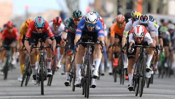 MOLINS DE REI, SPAIN - MARCH 25: (EDITOR'S NOTE: Alternate crop) (L-R) Maxim Van Gils of Belgium and Team Lotto Dstny, Kaden Groves of Australia and Team Alpecin-Deceuninck and Bryan Coquard of France and Team Cofidis sprint at finish line during the 102nd Volta Ciclista a Catalunya 2023, Stage 6 a 174.1km stage from Martorell to Molins de Rei / #UCIWT / on March 25, 2023 in Molins de Rey, Spain. (Photo by David Ramos/Getty Images)