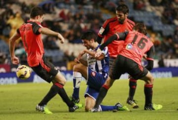 Juan Domínguez entre Elustondo, Markel Bergara y Canales.