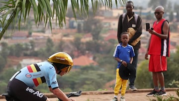 TOPSHOT - Belgian rider Remco Evenepoel competes in the men's Elite Individual Time Trial cycling event during the UCI 2025 Road World Championships, in Kigali, on September 21, 2025. (Photo by Anne-Christine POUJOULAT / AFP)