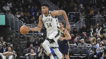 Mar 4, 2020; Milwaukee, Wisconsin, USA; Milwaukee Bucks forward Giannis Antetokounmpo (34) takes the ball downcourt against the Indiana Pacers in the third quarter at Fiserv Forum. Mandatory Credit: Benny Sieu-USA TODAY Sports