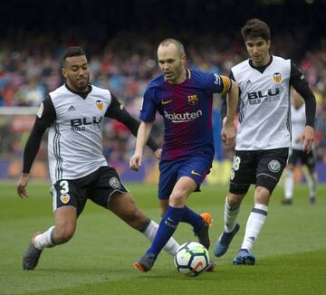 Catch him if you can: Andrés Iniesta in action against Valencia