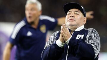 (FILES) In this file photo taken on March 07, 2020 Argentine former football star Diego Maradona acknowledges spectators during an homage before the start of the Argentina First Division 2020 Superliga Tournament football match Boca Juniors vs Gimnasia La Plata, at La Bombonera stadium, in Buenos Aires. - Argentine football great Diego Maradona was admitted to hospital on November 2, 2020 for medical checks, his personal doctor announced. (Photo by ALEJANDRO PAGNI / AFP)