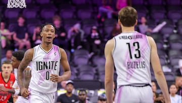 LAS VEGAS, NEVADA - SEPTEMBER 06: Ron Holland #0 of G League Ignite reacts with teammate Matas Buzelis #13 after Holland scored against the Perth Wildcats in the second half of an NBA G League Fall Invitational game on September 06, 2023 in Las Vegas, Nevada. Ignite defeated the Wildcats 124-105. NOTE TO USER: User expressly acknowledges and agrees that, by downloading and or using this photograph, User is consenting to the terms and conditions of the Getty Images License Agreement.   Ethan Miller/Getty Images/AFP (Photo by Ethan Miller / GETTY IMAGES NORTH AMERICA / Getty Images via AFP)