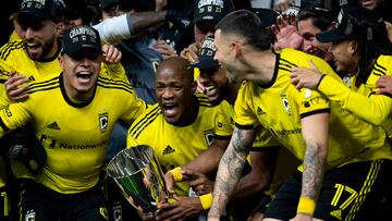 Dec 2, 2023; Cincinnati, Ohio, USA; Columbus Crew midfielder Darlington Nagbe (center) holds the Eastern Conference Trophy after winning the MLS Eastern Conference Final against FC Cincinnati at TQL Stadium. Mandatory Credit: Albert Cesare-USA TODAY Sports