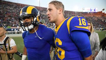 LOS ANGELES, CA - NOVEMBER 11: Quarterback Jared Goff #16 and defensive end Aaron Donald #99 of the Los Angeles Rams walk off the field after winning 36-31 against the Seattle Seahawks at Los Angeles Memorial Coliseum on November 11, 2018 in Los Angeles, California. John McCoy/Getty Images/AFP
== FOR NEWSPAPERS, INTERNET, TELCOS & TELEVISION USE ONLY ==