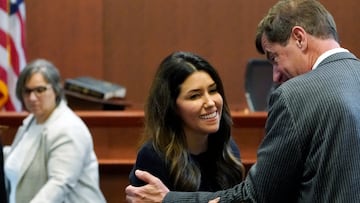 Attorney Camille Vasquez talks with attorney Ben Chew, at the end of the daily proceedings at the Fairfax County Circuit Courthouse in Fairfax, Va., U.S., May 16, 2022. Steve Helber/Pool via REUTERS